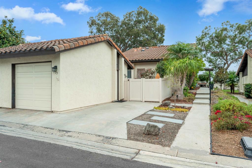 315 Volney Lane Encinitas, CA 92024 - Photo 37 of 51 a backyard of a house with lots of green space