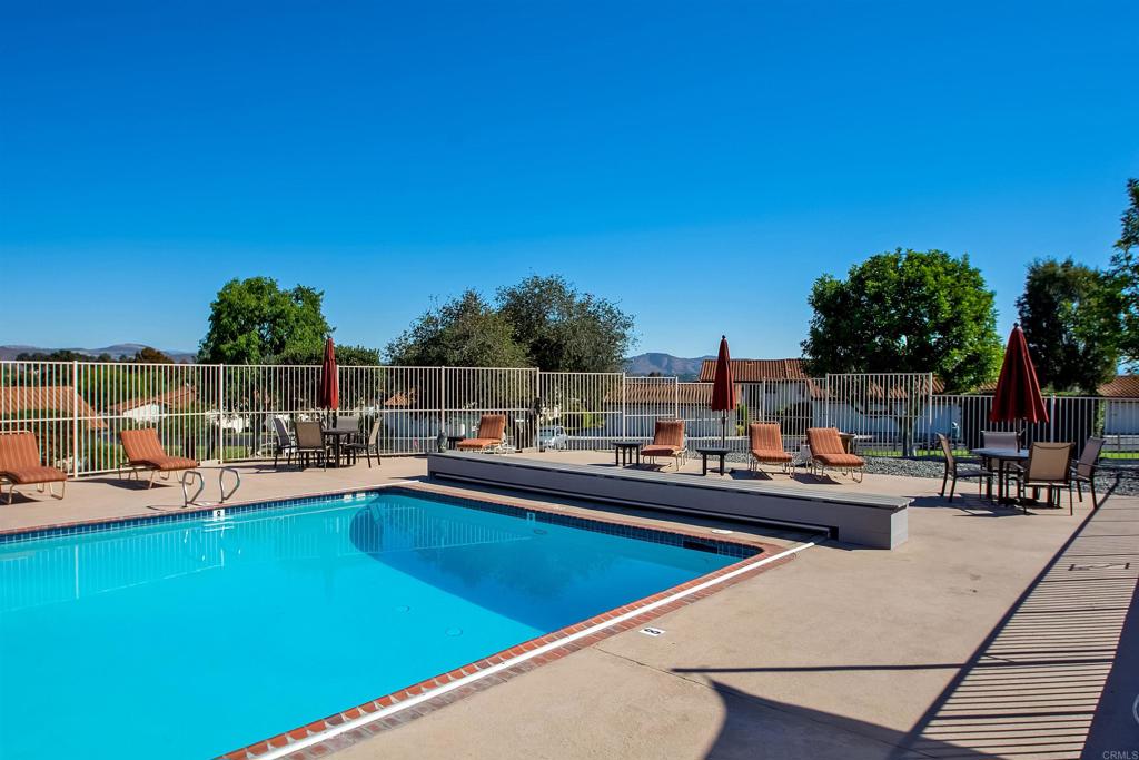315 Volney Lane Encinitas, CA 92024 - Photo 44 of 51 a view of a swimming pool with outdoor seating