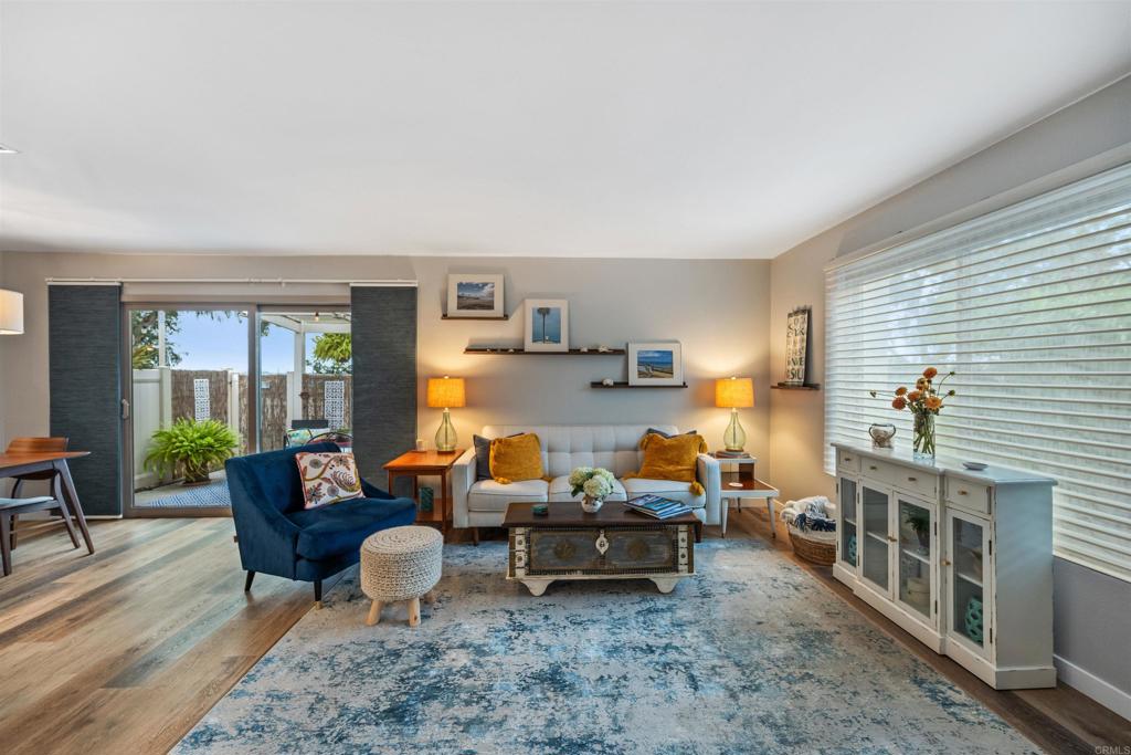 315 Volney Lane Encinitas, CA 92024 - Photo 6 of 51 a living room with furniture and a wooden floor
