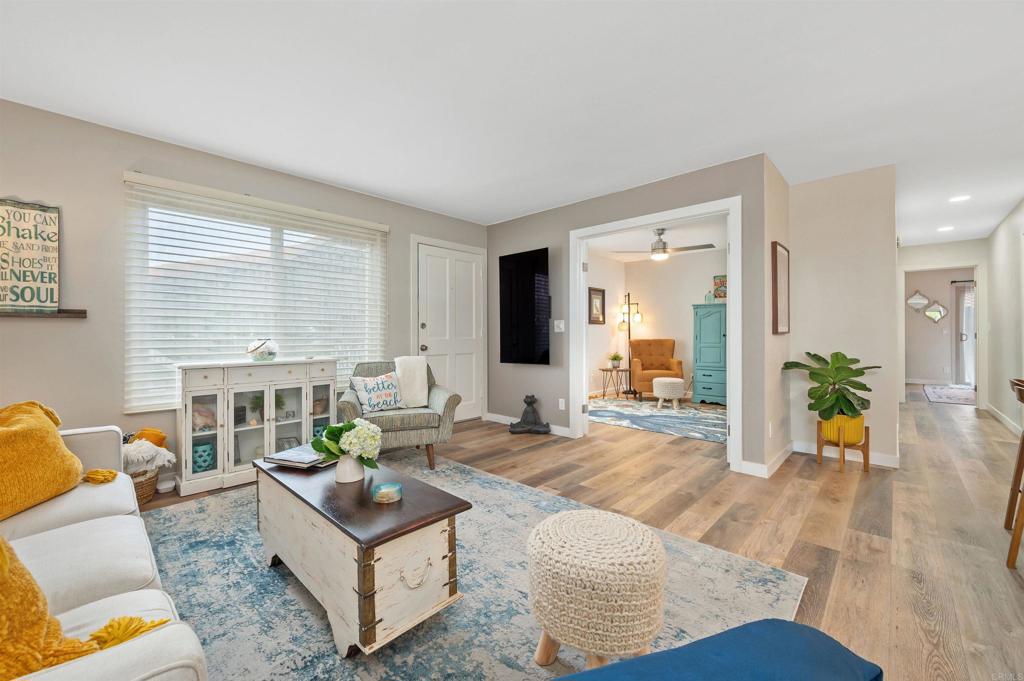 315 Volney Lane Encinitas, CA 92024 - Photo 9 of 51 a living room with furniture and wooden floor