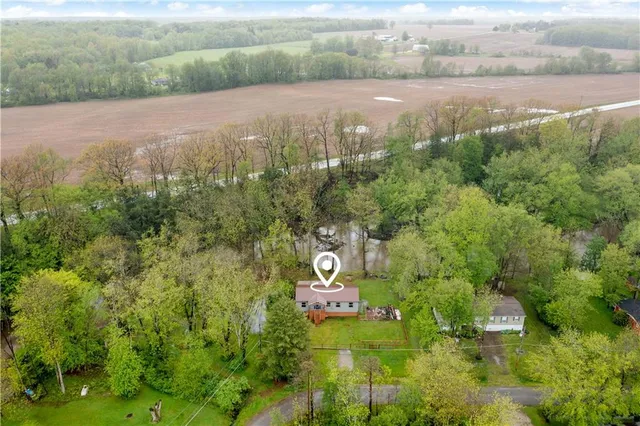 a view of a yard with an outdoor space