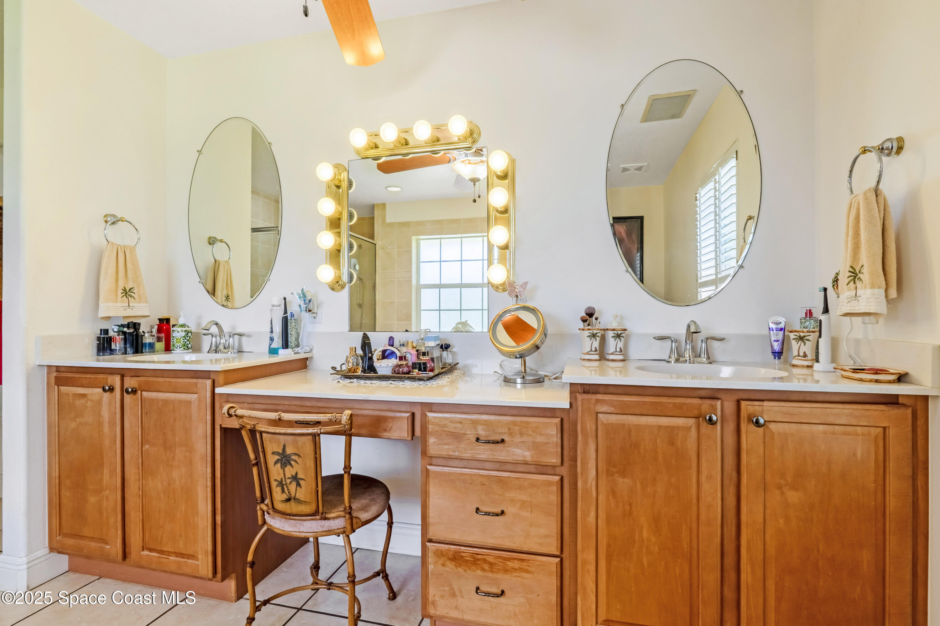4985 Hamlin Circle Mims, FL 32754 - Photo 20 of 39 a bathroom with a double vanity sink and a mirror