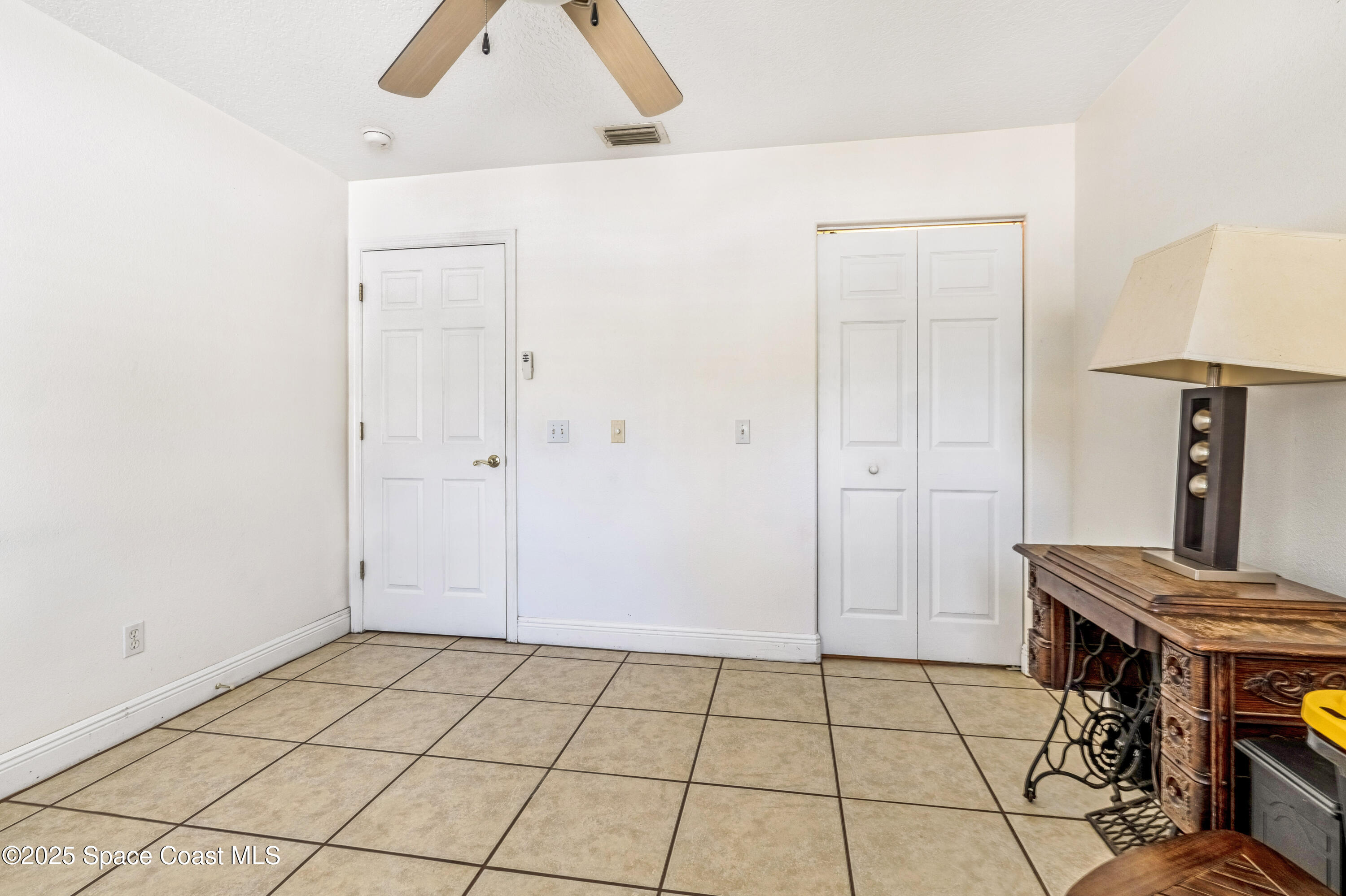 4985 Hamlin Circle Mims, FL 32754 - Photo 28 of 39 a view of room with workspace