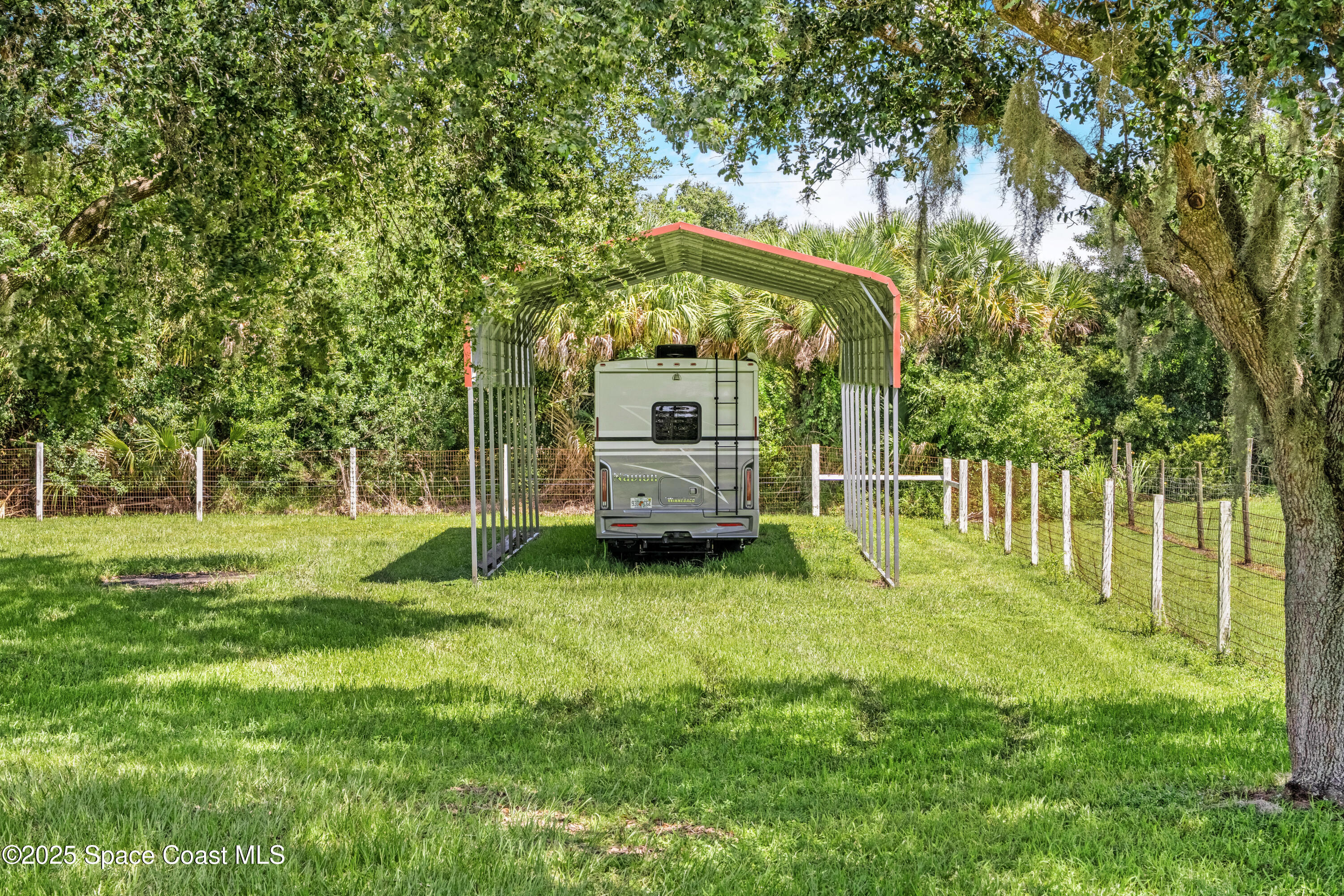4985 Hamlin Circle Mims, FL 32754 - Photo 39 of 39 a view of a park with a large tree
