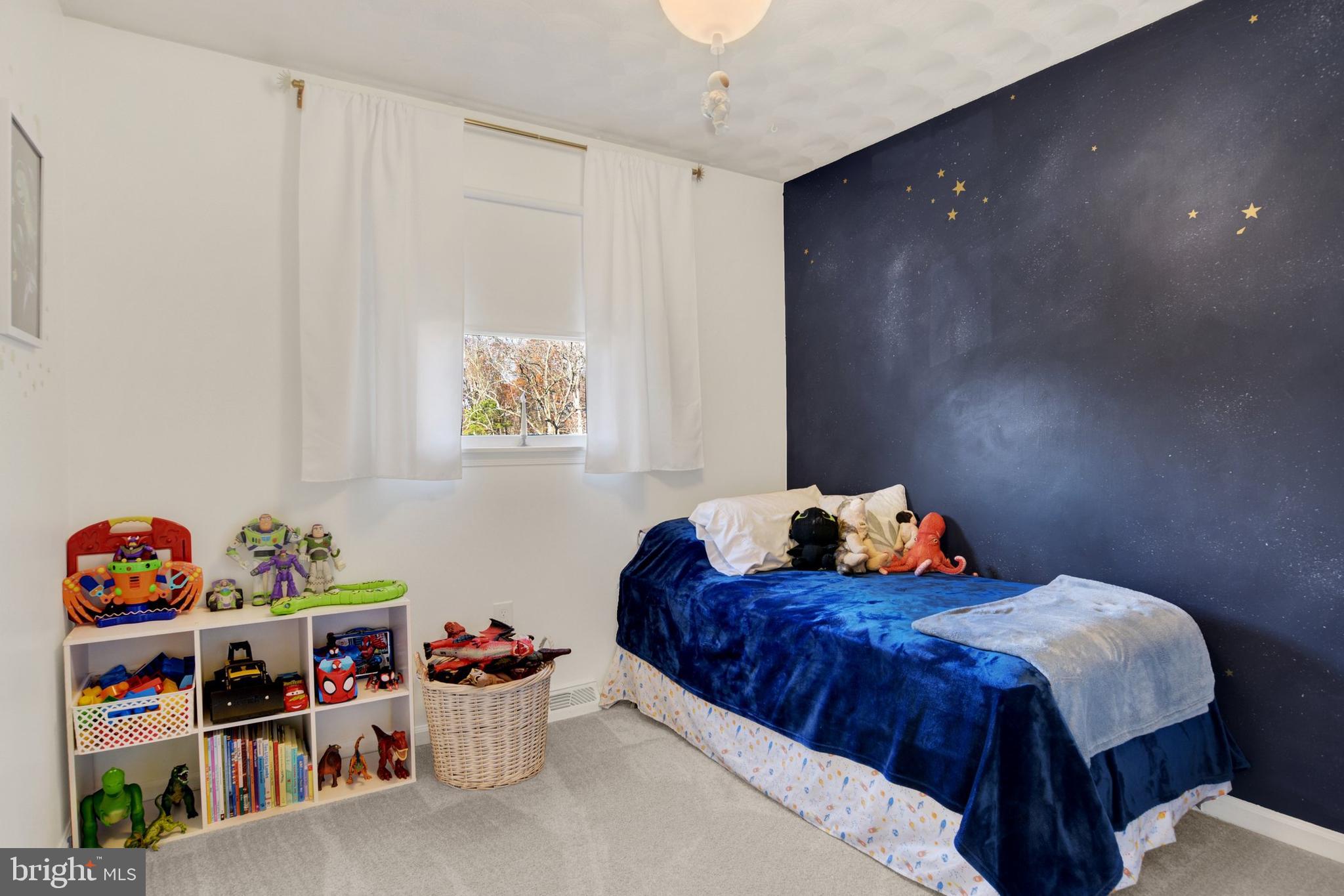 329 South Crawford Road Hummelstown, PA 17036 - Photo 12 of 17 a bedroom with bed and book shelf