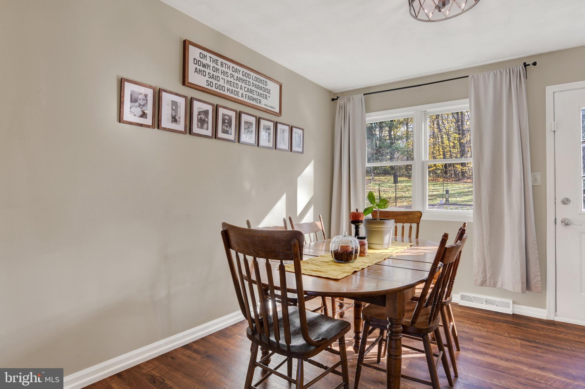 329 South Crawford Road Hummelstown, PA 17036 - Photo 5 of 17 a view of a dining room with furniture window and wooden floor