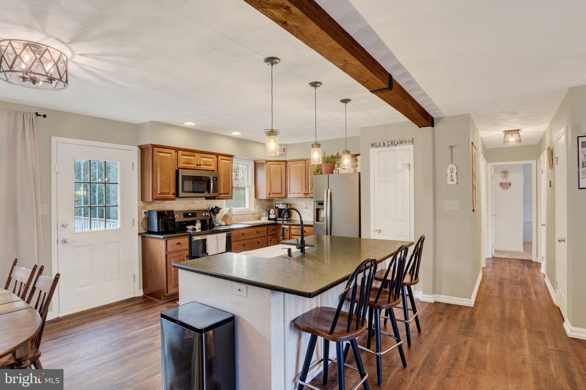 329 South Crawford Road Hummelstown, PA 17036 - Photo 6 of 17 a view of a dining room with furniture window and wooden floor
