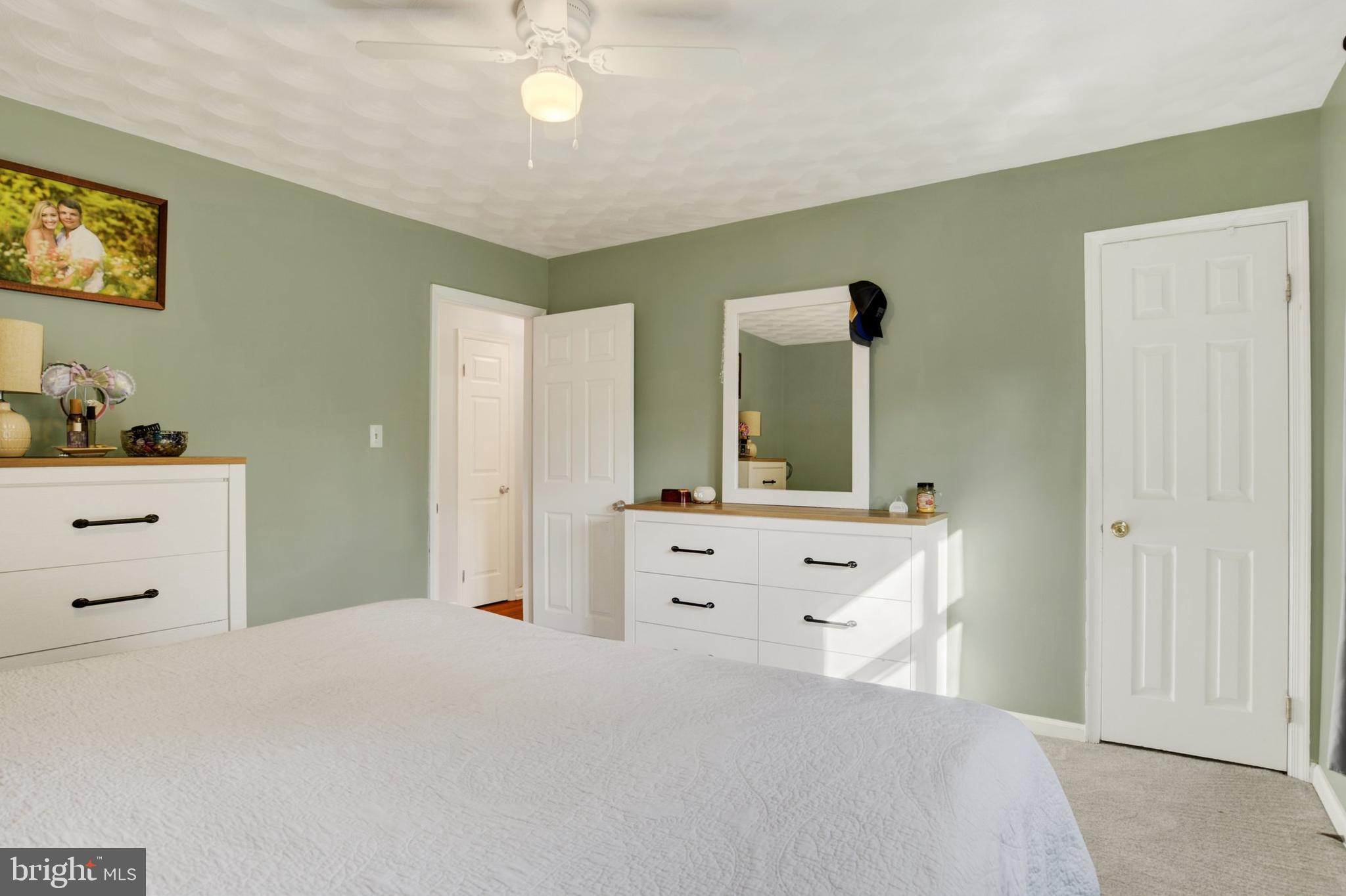 329 South Crawford Road Hummelstown, PA 17036 - Photo 10 of 17 a bedroom with a bed and a dresser