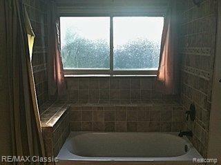 1631 South Commerce Road Walled Lake, MI 48390 - Photo 3 of 11 bath1