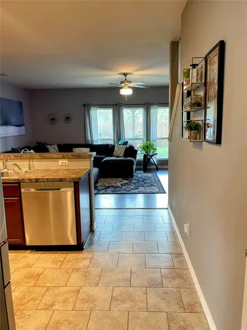 a lobby with furniture and window