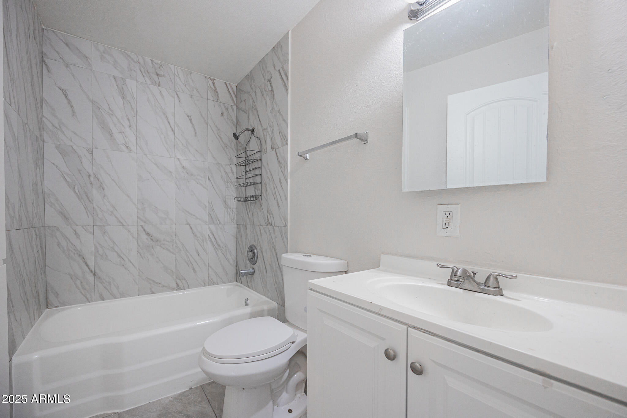 2123 West Devonshire Avenue, Unit 14 Phoenix, AZ 85015 - Photo 9 of 13 a bathroom with a sink toilet and shower