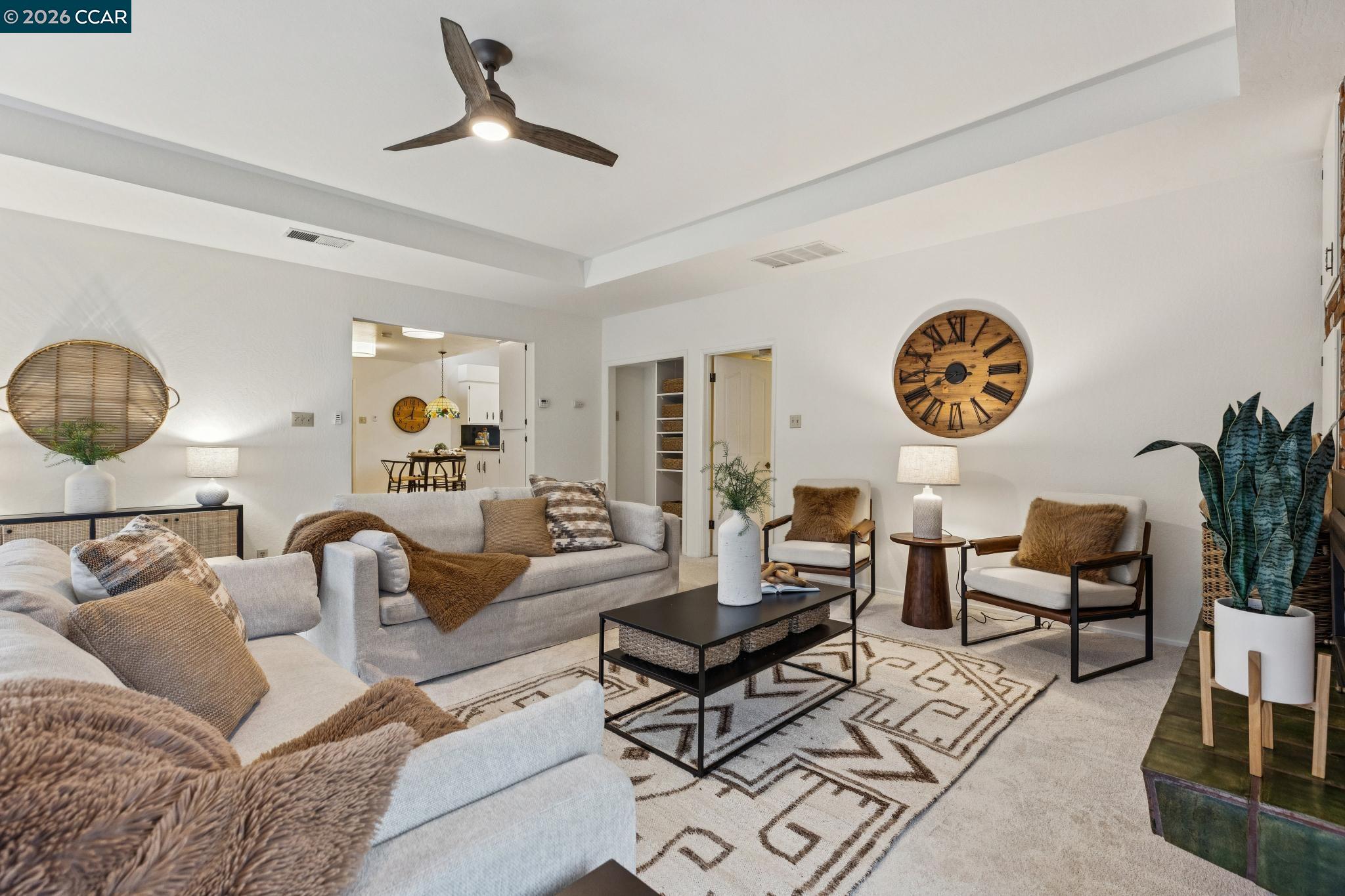 411 La Vista Road Walnut Creek, CA 94598 - Photo 22 of 57 a living room with furniture and a large window