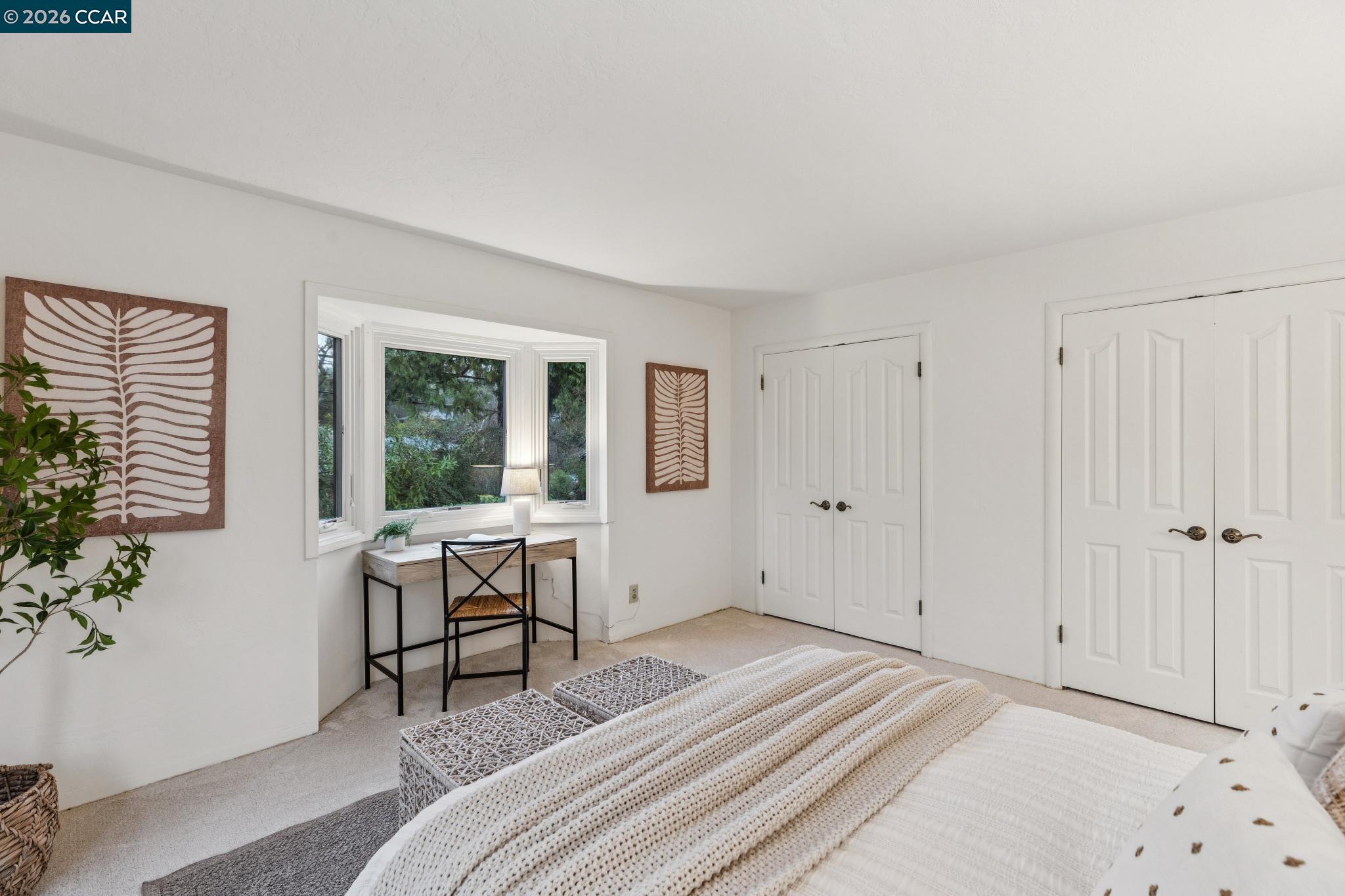 411 La Vista Road Walnut Creek, CA 94598 - Photo 25 of 57 a bedroom with a bed and a window