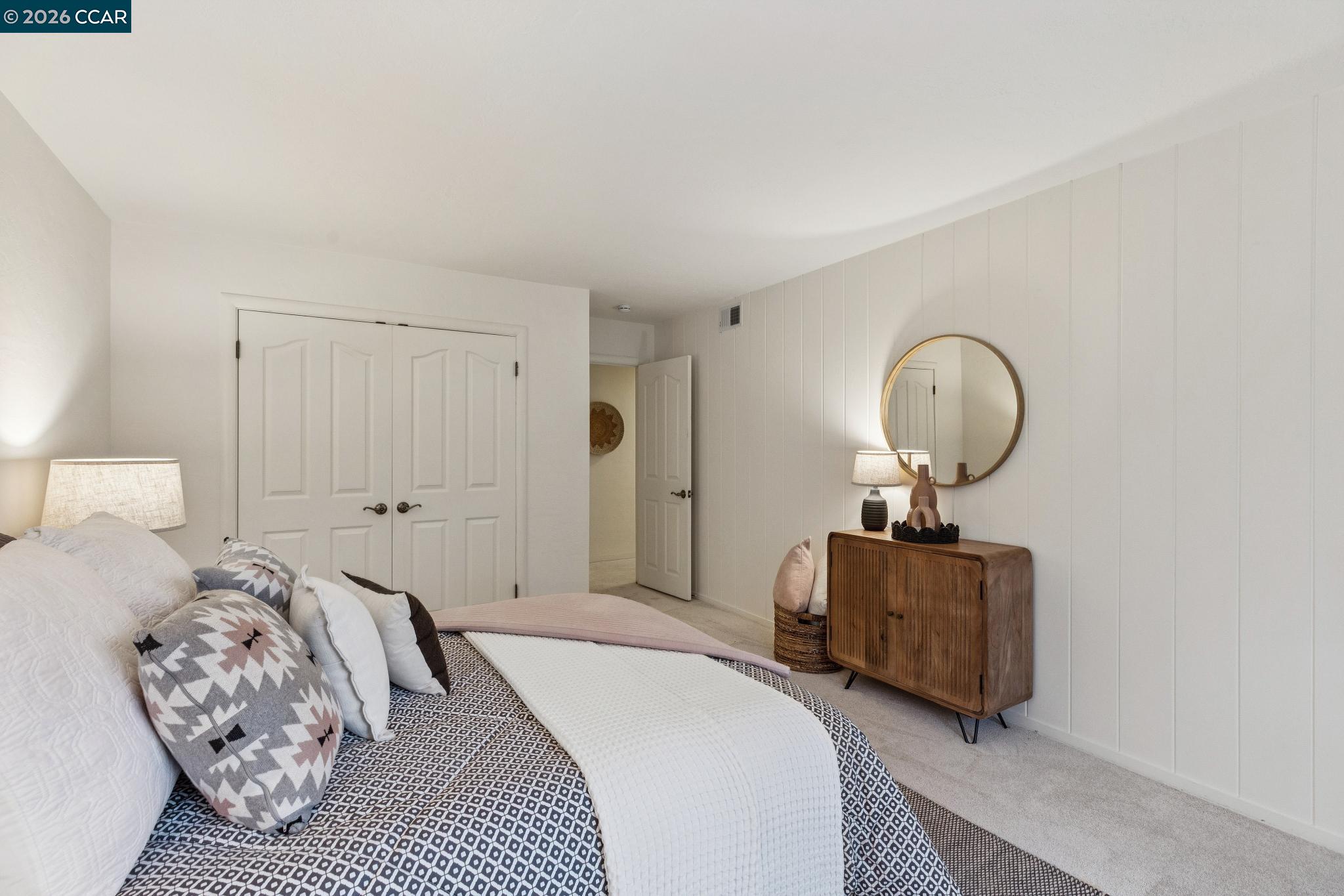 411 La Vista Road Walnut Creek, CA 94598 - Photo 28 of 57 a bedroom with bed and a table