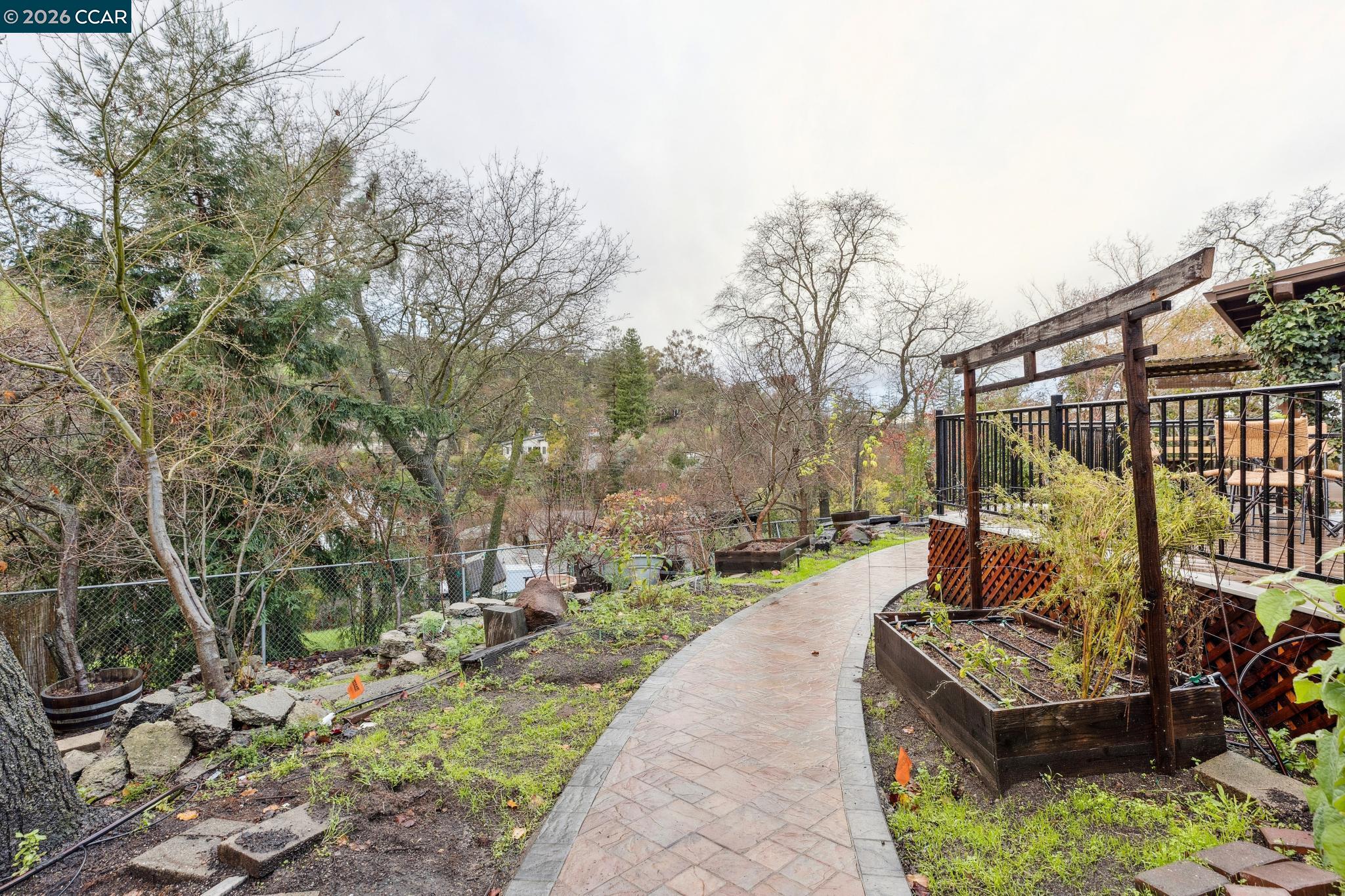 411 La Vista Road Walnut Creek, CA 94598 - Photo 40 of 57 a view of a garden with patio