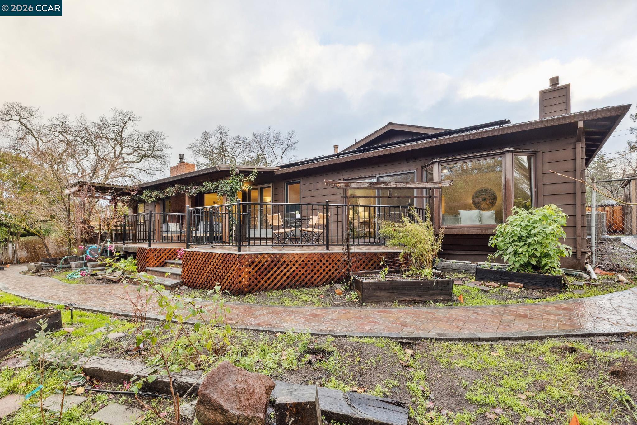 411 La Vista Road Walnut Creek, CA 94598 - Photo 41 of 57 a front view of a house with garden