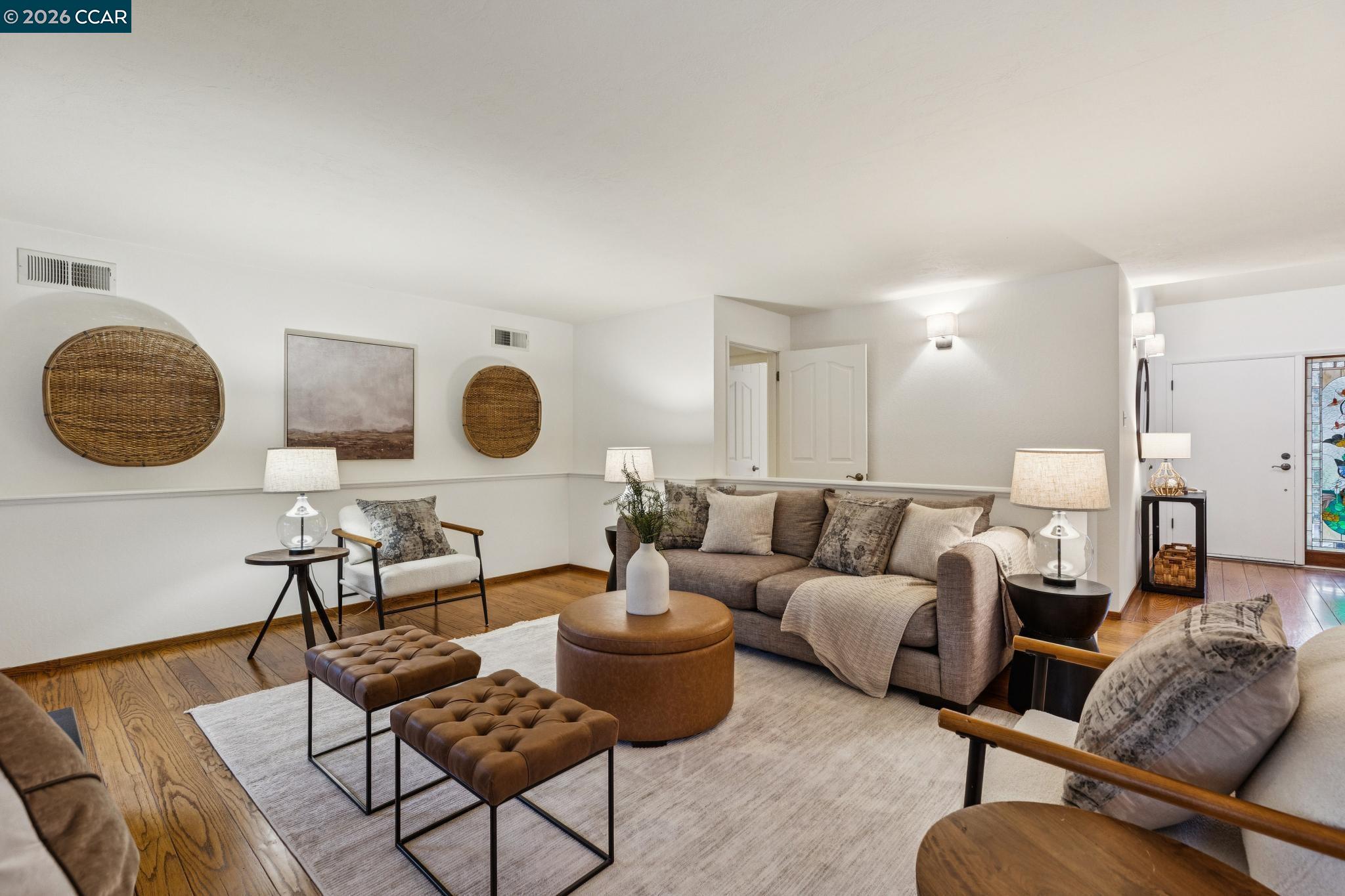 411 La Vista Road Walnut Creek, CA 94598 - Photo 8 of 57 a living room with furniture and a mirror