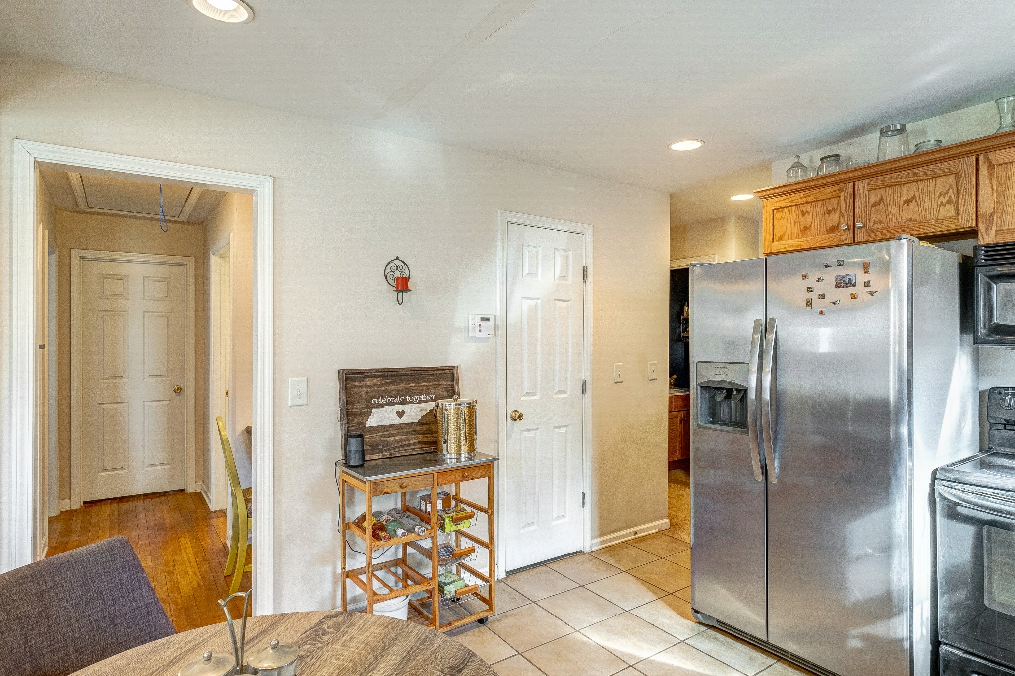 725 Neelys Bend Road Madison, TN 37115 - Photo 7 of 13 a refrigerator freezer sitting inside of a room
