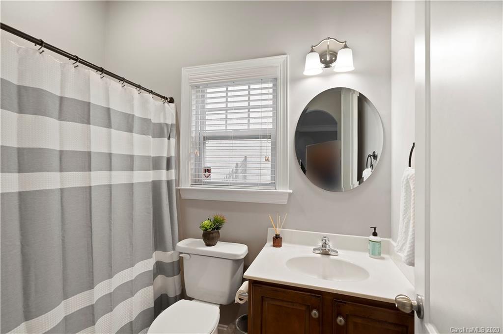 2011 Fallondale Road Waxhaw, NC 28173 - Photo 21 of 39 a bathroom with a sink toilet and shower