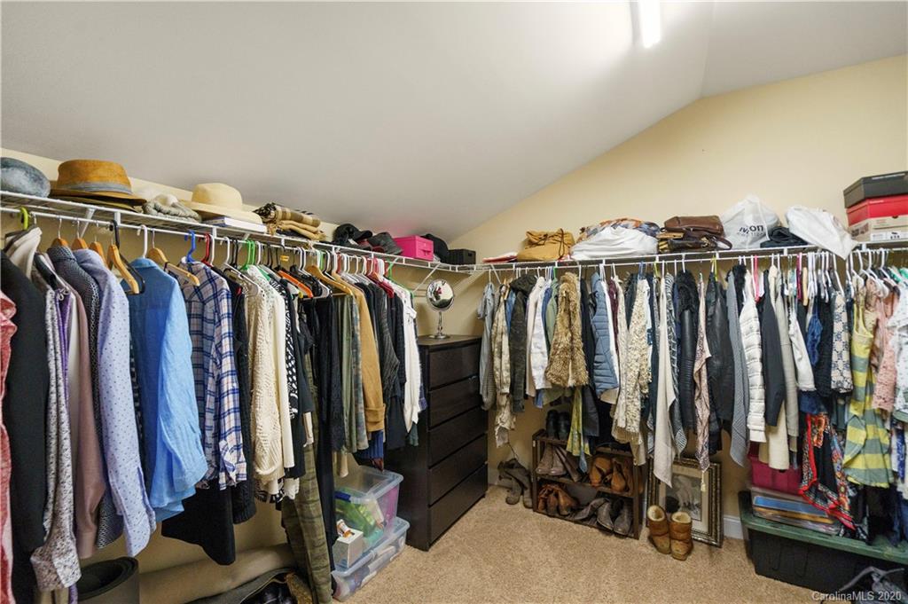 2011 Fallondale Road Waxhaw, NC 28173 - Photo 28 of 39 a view of walk in closet with clothes and shoes