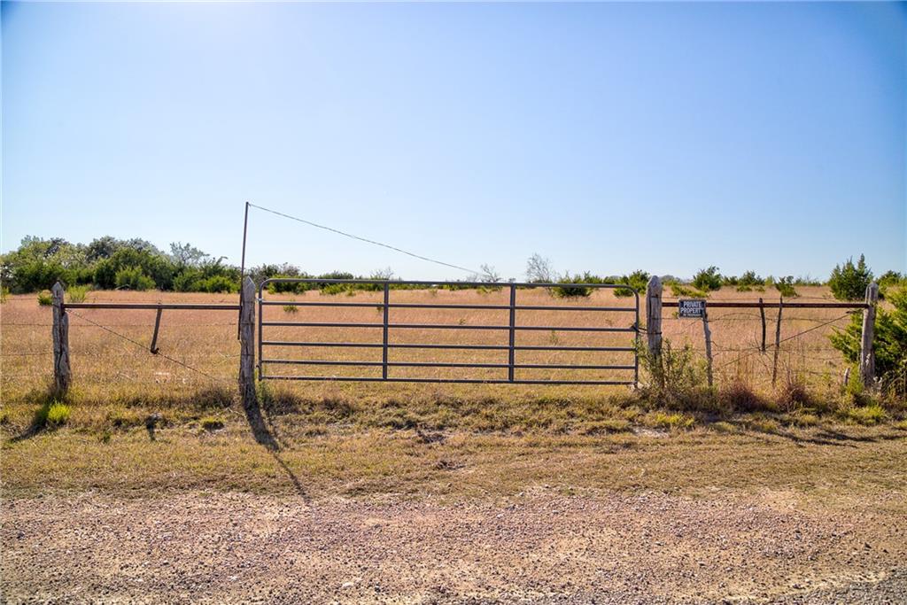 180 Nordic Ridge Road Bertram, TX 78605 - Photo 1 of 12 View of yard with a gate and a view of rural / pastoral area
