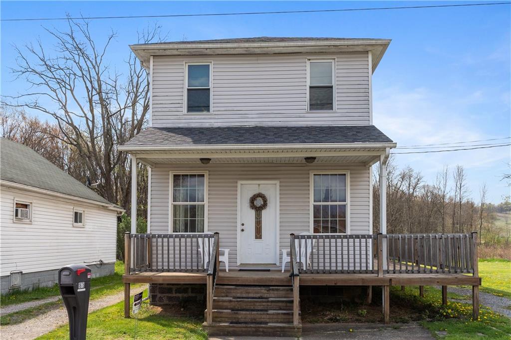 1878 Jefferson Road Rices Landing, PA 15357 - Photo 1 of 38 front view of a house with a bench