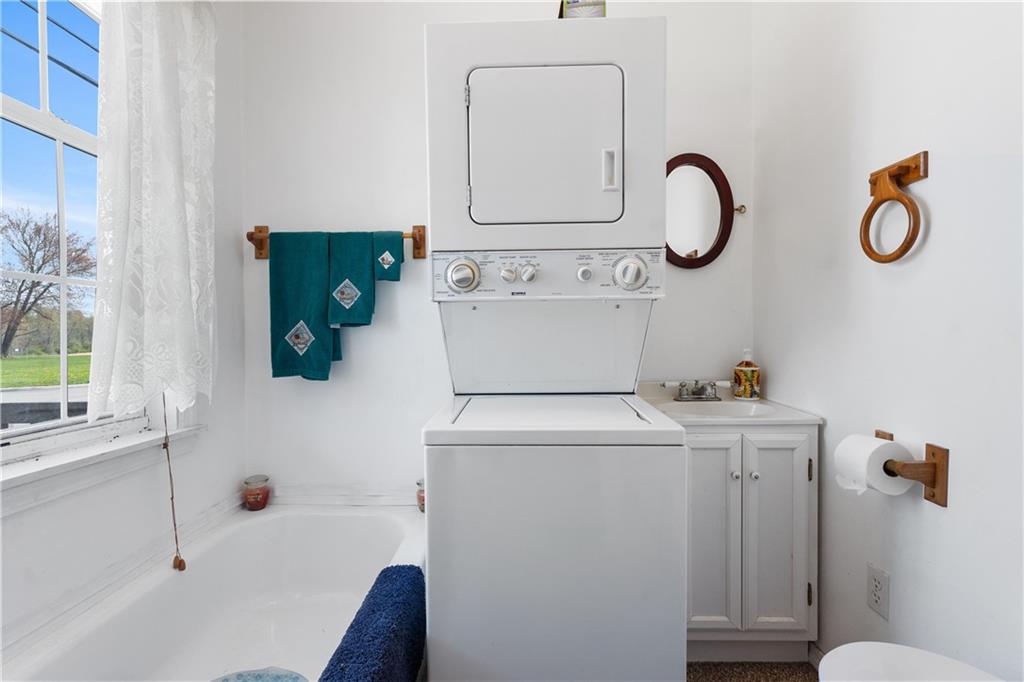 1878 Jefferson Road Rices Landing, PA 15357 - Photo 16 of 38 a bathroom with a sink and a mirror