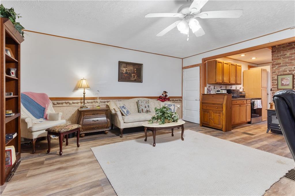 1878 Jefferson Road Rices Landing, PA 15357 - Photo 3 of 38 a living room with furniture and wooden floor