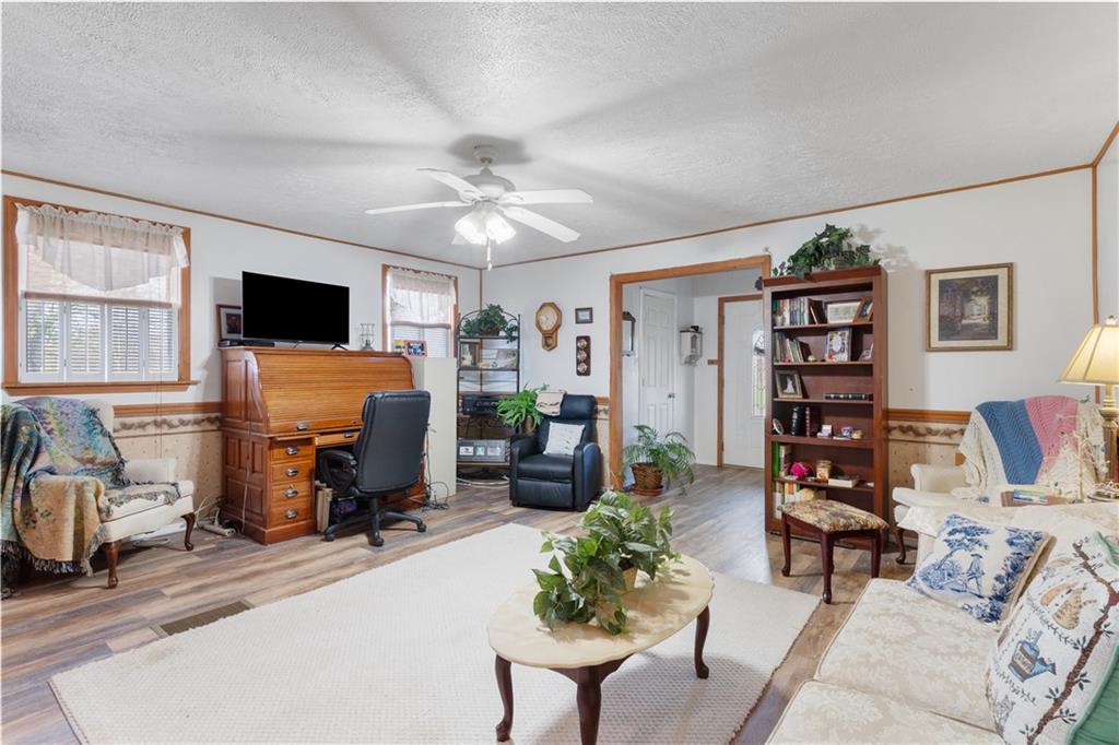 1878 Jefferson Road Rices Landing, PA 15357 - Photo 5 of 38 a living room with furniture and a flat screen tv