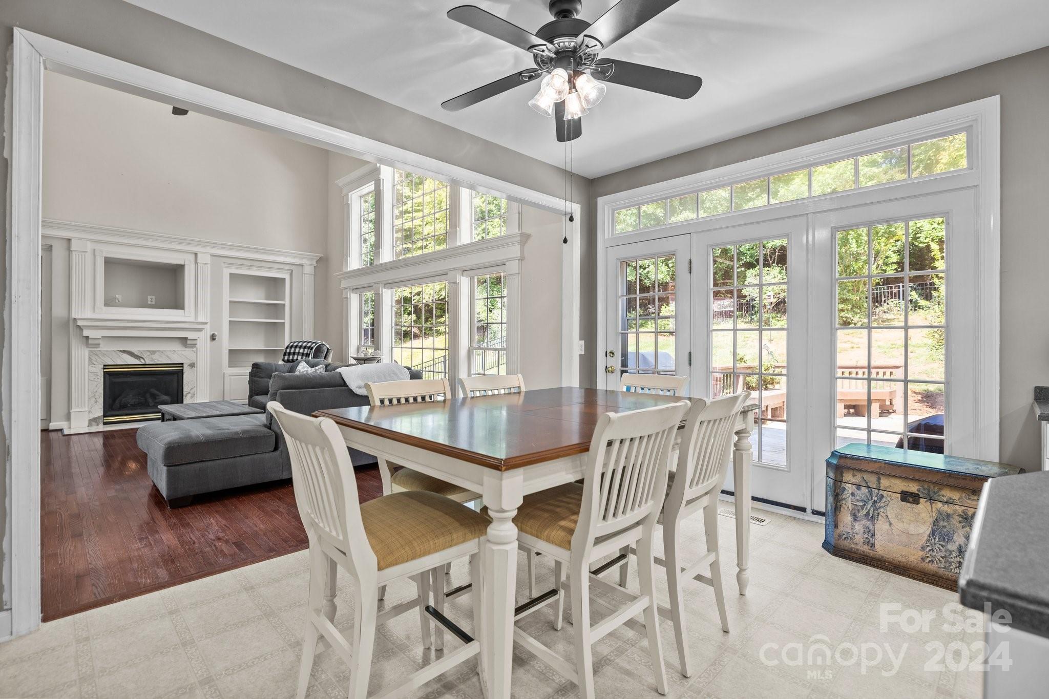 309 Chancelot Lane Fort Mill, SC 29708 - Photo 24 of 43 a view of a dining room with furniture window and wooden floor