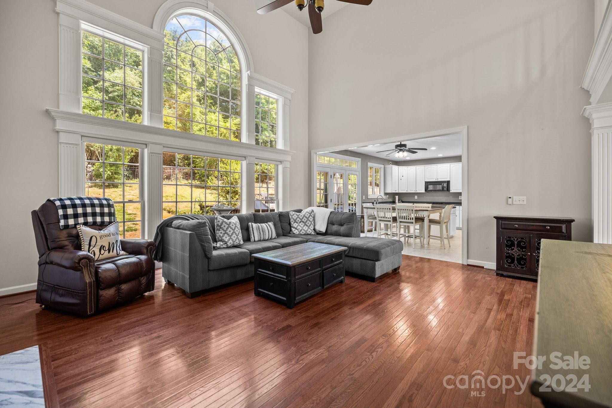 309 Chancelot Lane Fort Mill, SC 29708 - Photo 26 of 43 a living room with furniture and a large window