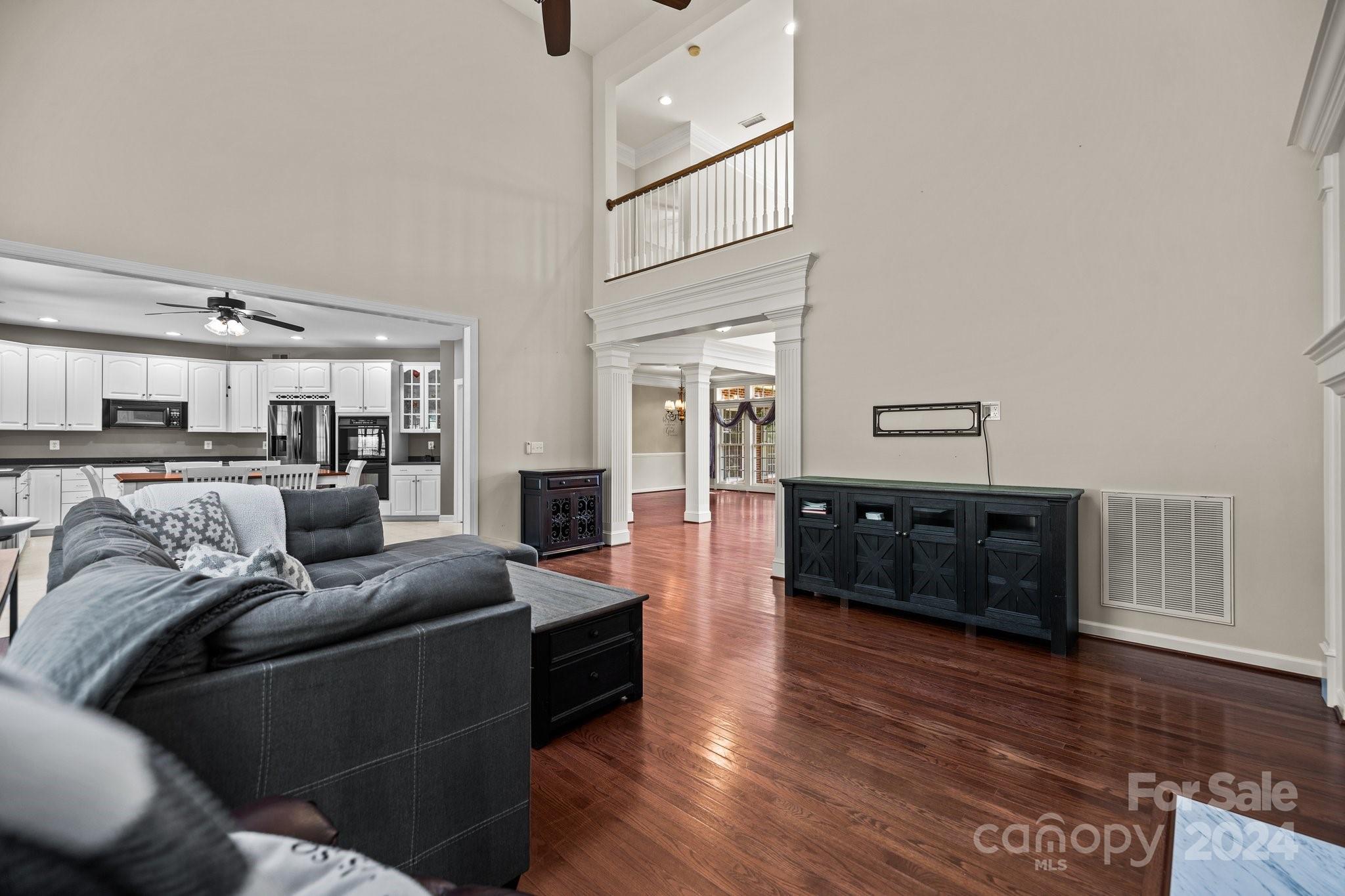 309 Chancelot Lane Fort Mill, SC 29708 - Photo 27 of 43 a living room with furniture and wooden floor