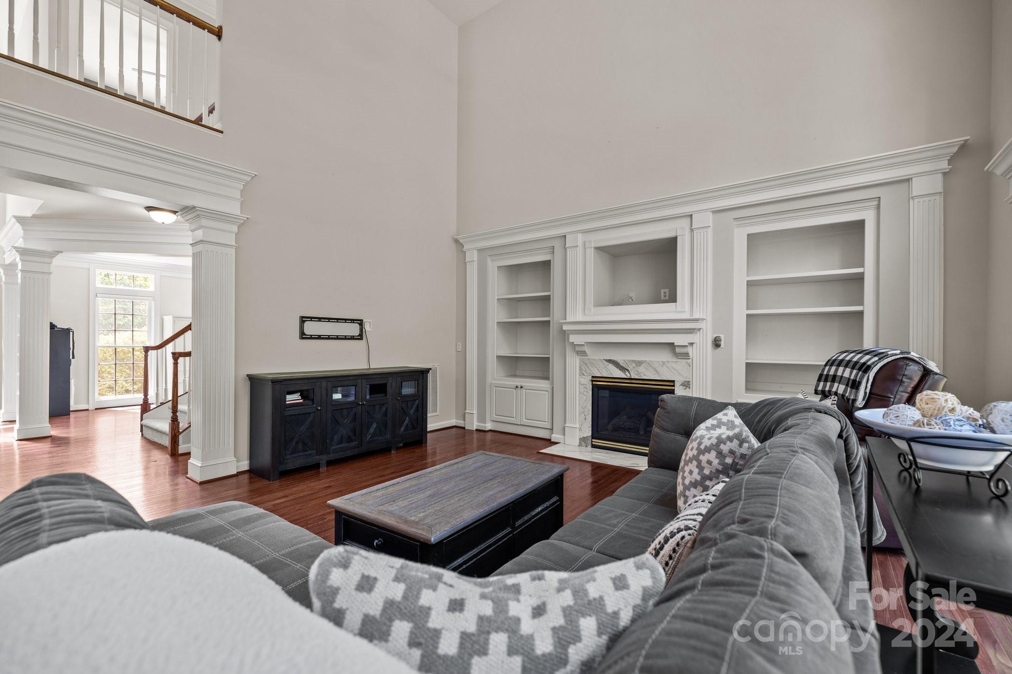 309 Chancelot Lane Fort Mill, SC 29708 - Photo 28 of 43 a living room with furniture and a fireplace