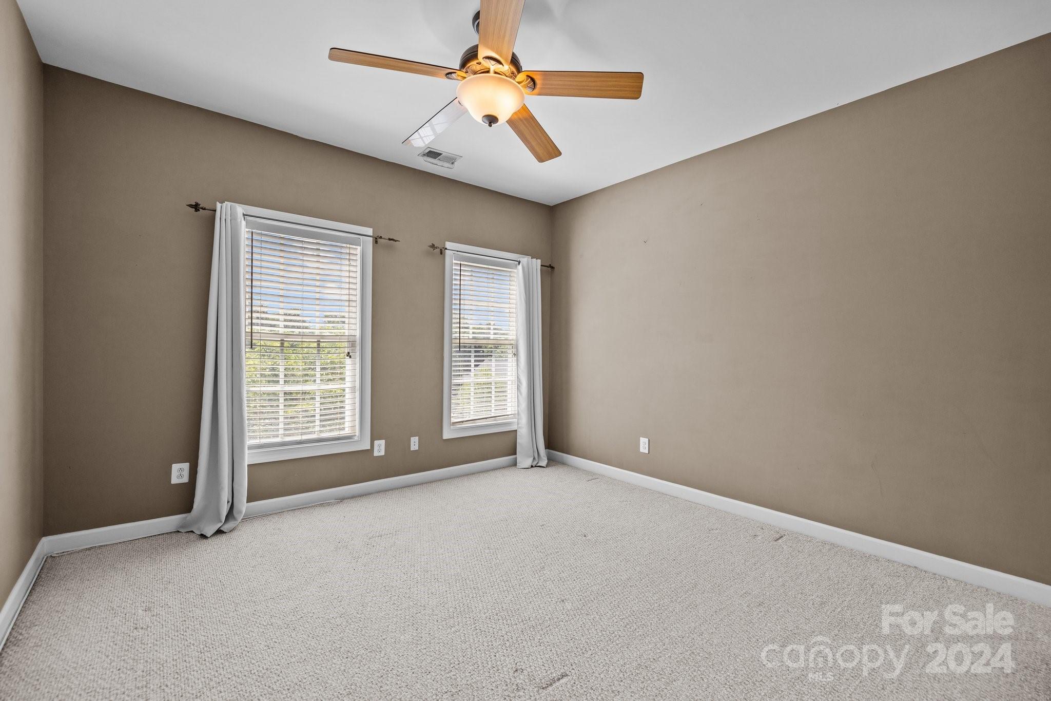 309 Chancelot Lane Fort Mill, SC 29708 - Photo 31 of 43 a view of an empty room with a window