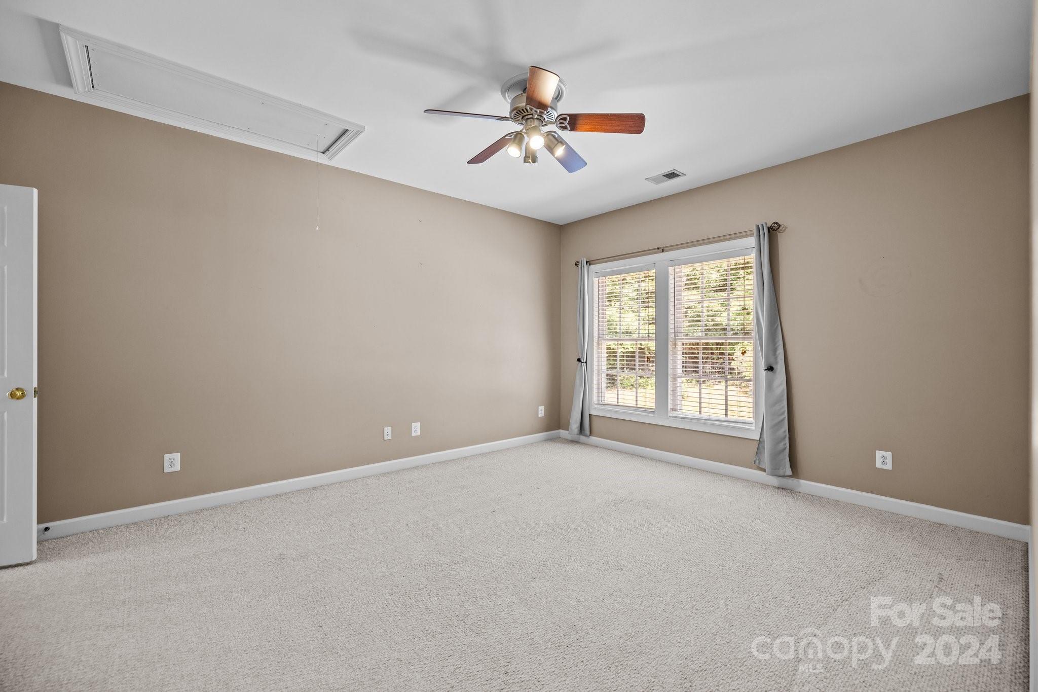 309 Chancelot Lane Fort Mill, SC 29708 - Photo 35 of 43 a view of an empty room with a window