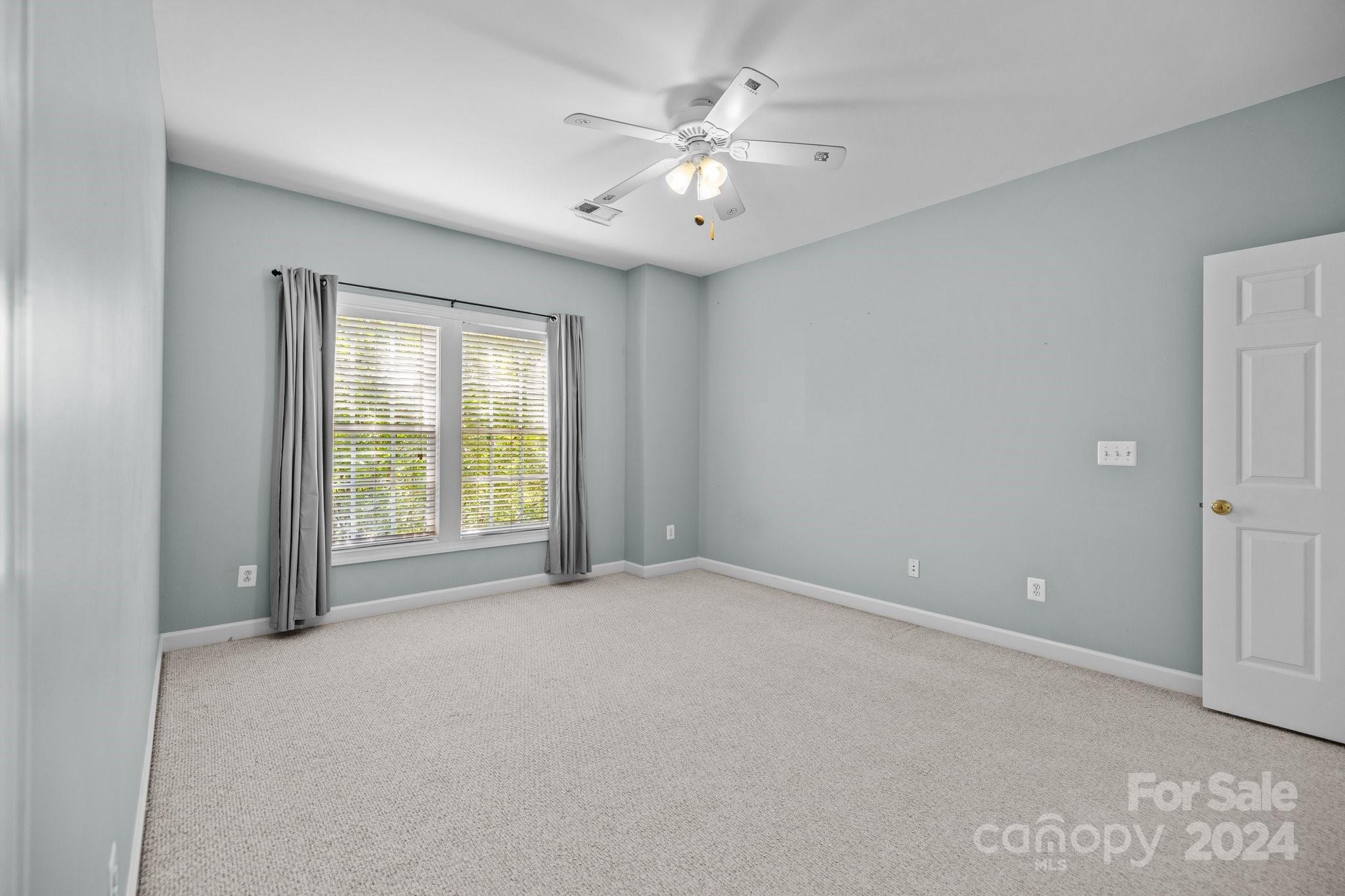 309 Chancelot Lane Fort Mill, SC 29708 - Photo 38 of 43 a view of an empty room with a window