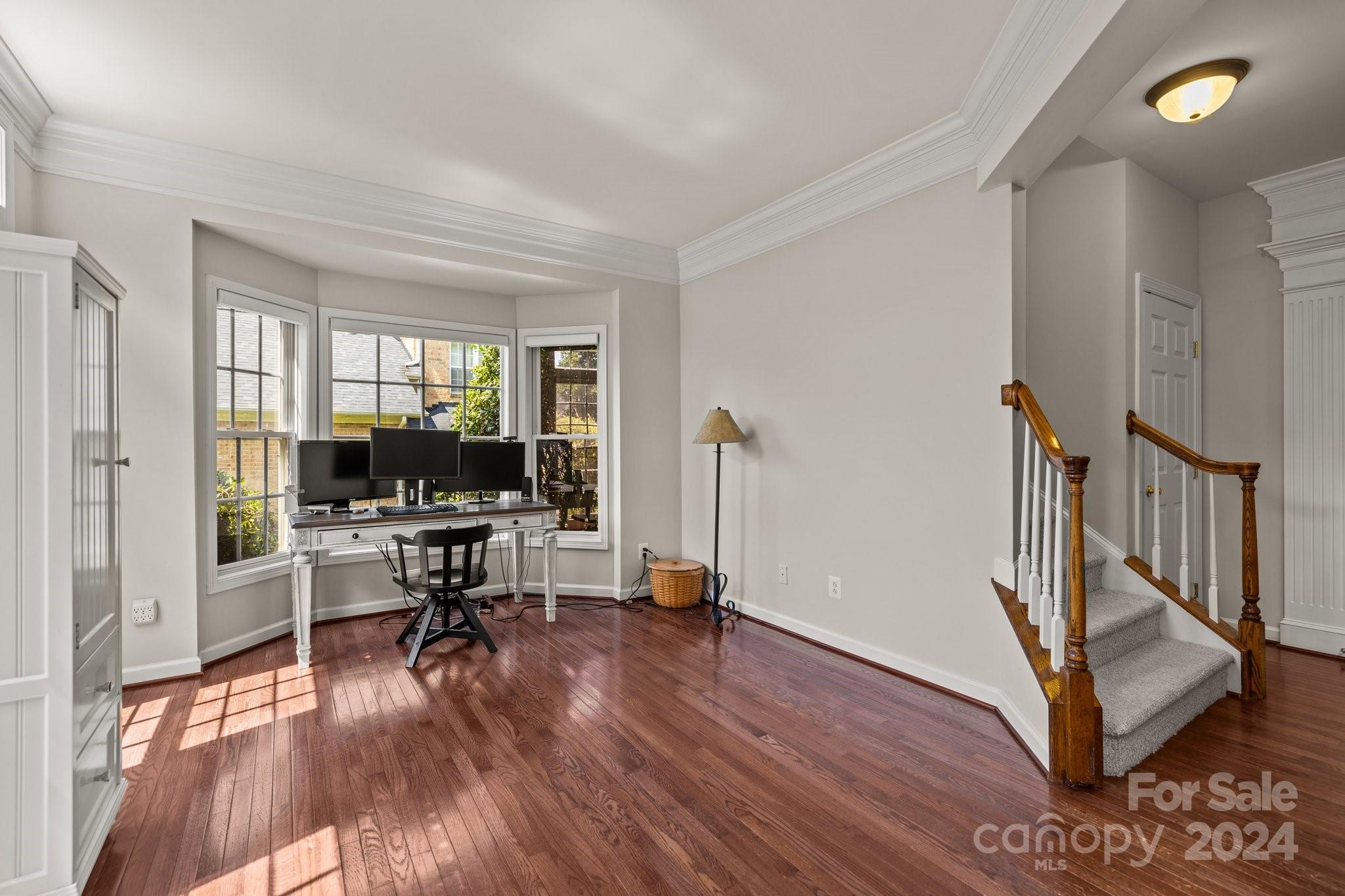 309 Chancelot Lane Fort Mill, SC 29708 - Photo 7 of 43 a view of a livingroom with hardwood floor and a window