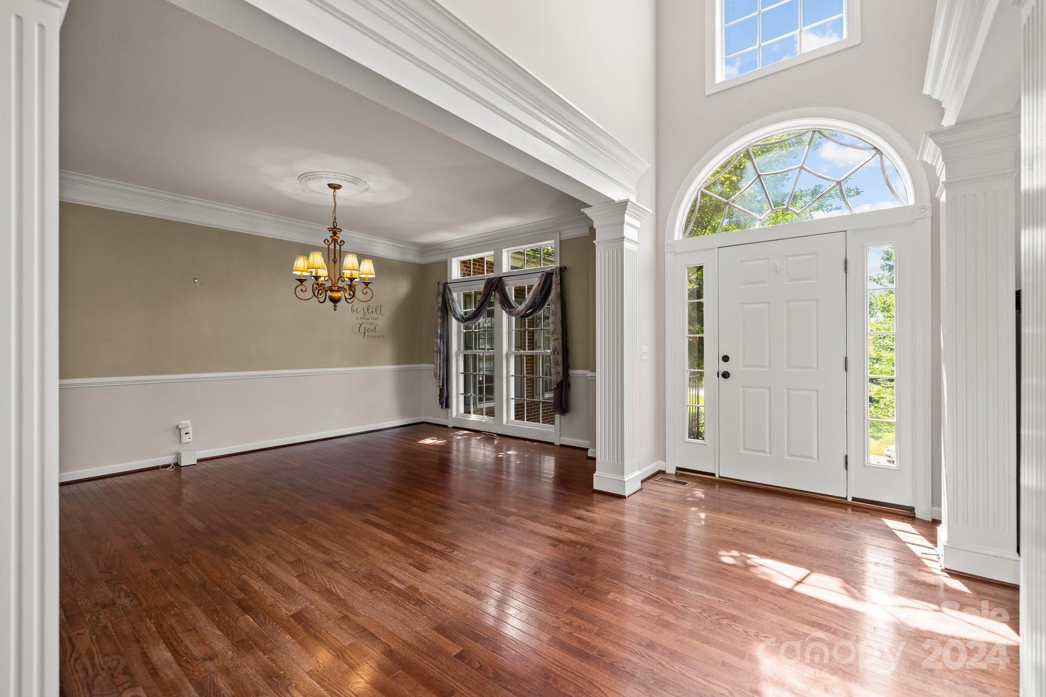 309 Chancelot Lane Fort Mill, SC 29708 - Photo 8 of 43 wooden floor in an empty room with a window