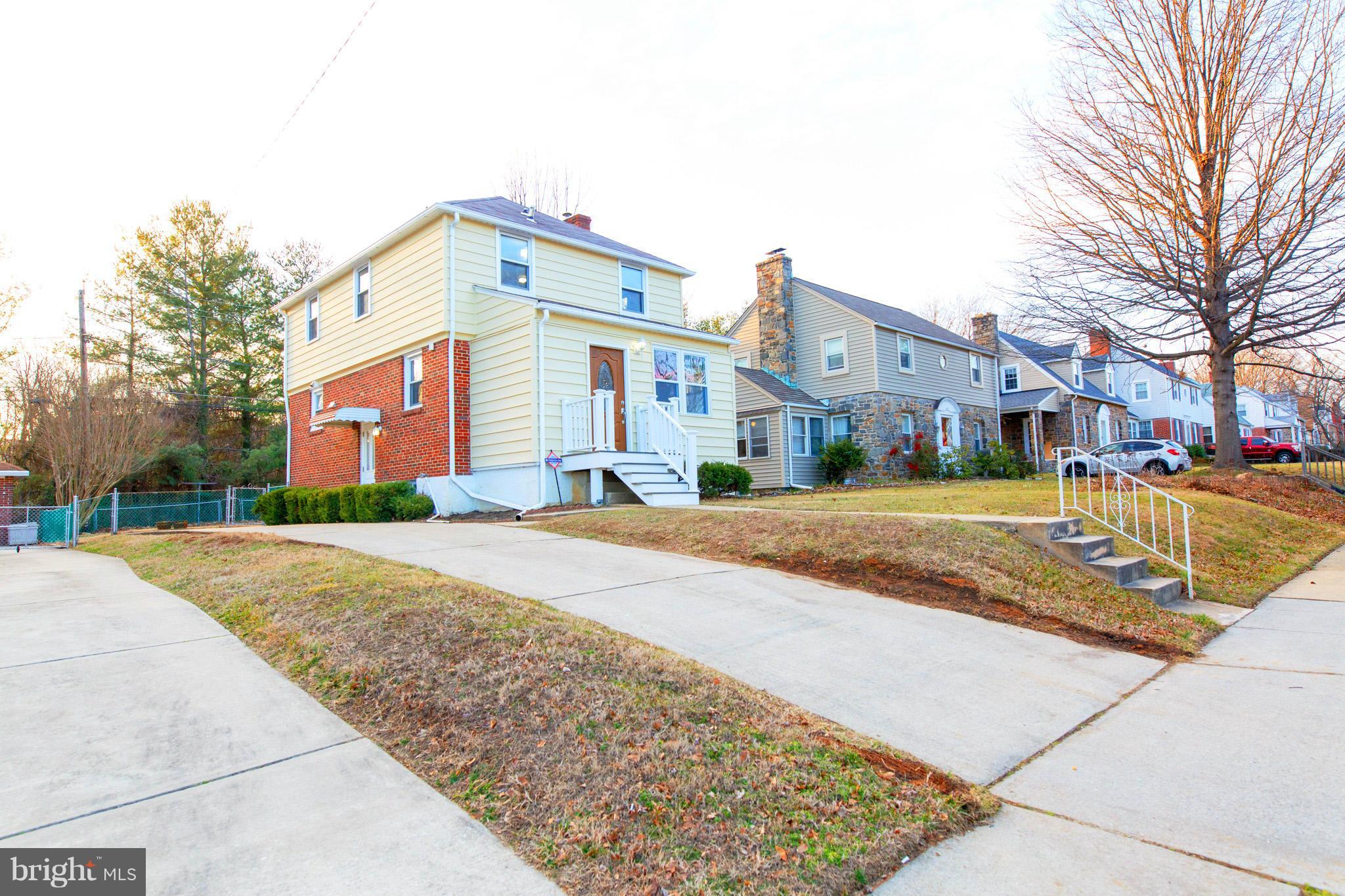 630 Warwick Road Baltimore, MD 21229 - Photo 1 of 23 a front view of a building with street