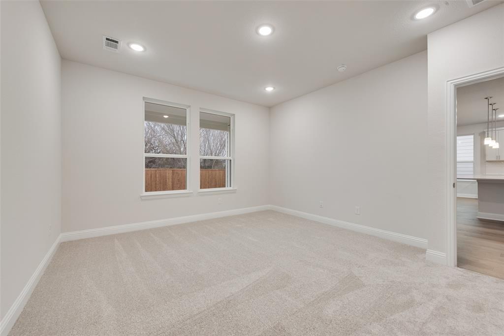 1013 Canoe Way Crowley, TX 76036 - Photo 22 of 26 an empty room with windows
