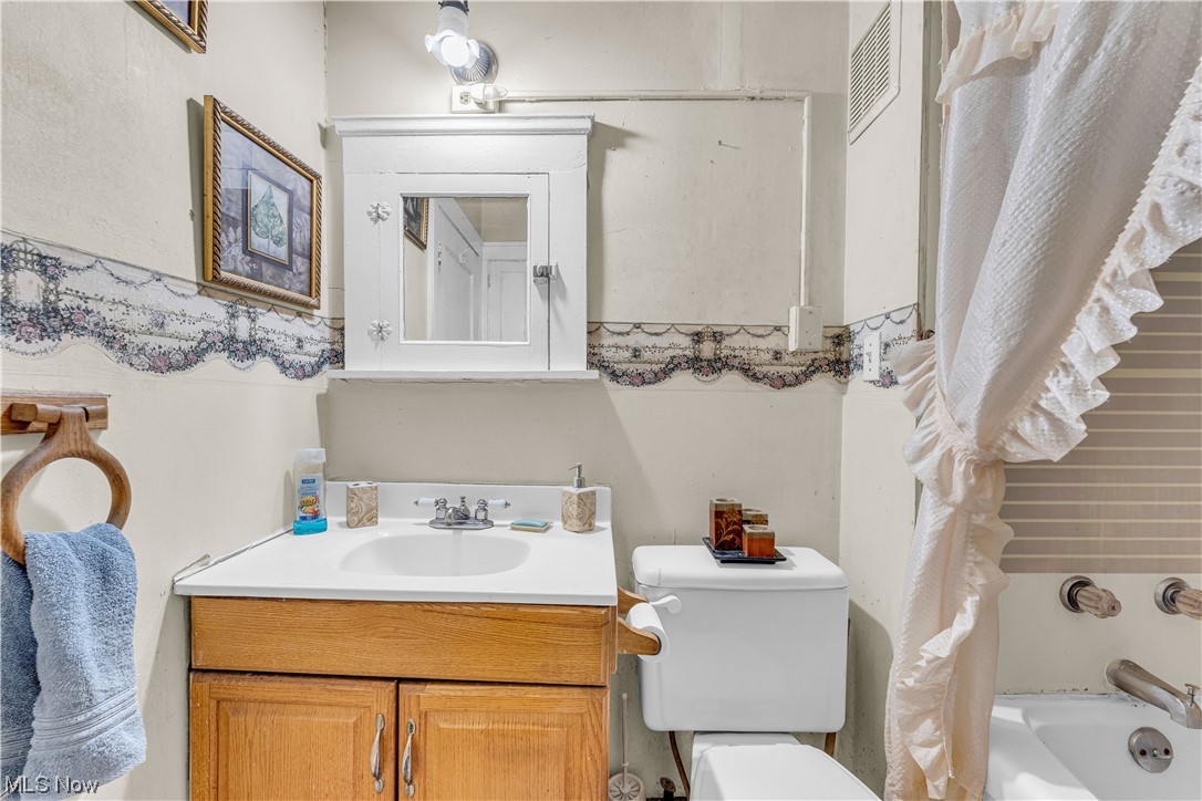 3550 Bosworth Road Cleveland, OH 44111 - Photo 15 of 43 Bathroom featuring toilet and oversized vanity