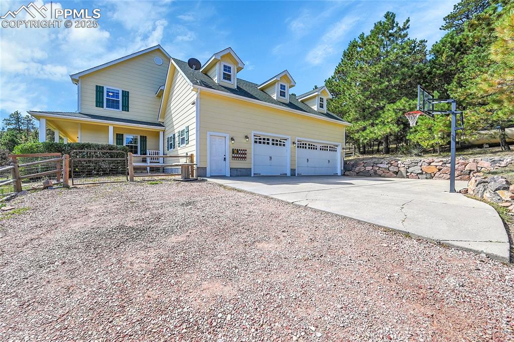 16540 Mesquite Road Peyton, CO 80831 - Photo 2 of 50 a view of a house with a yard and sitting area