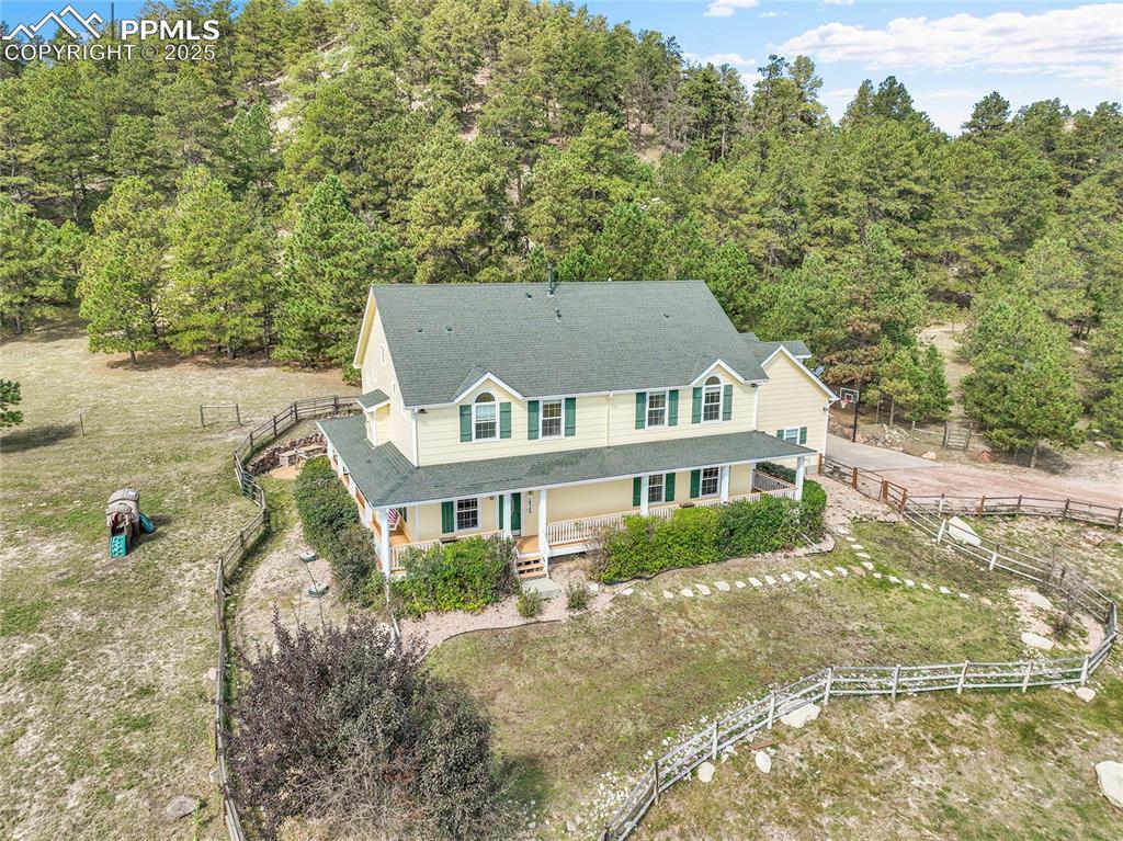 16540 Mesquite Road Peyton, CO 80831 - Photo 4 of 50 an aerial view of a house