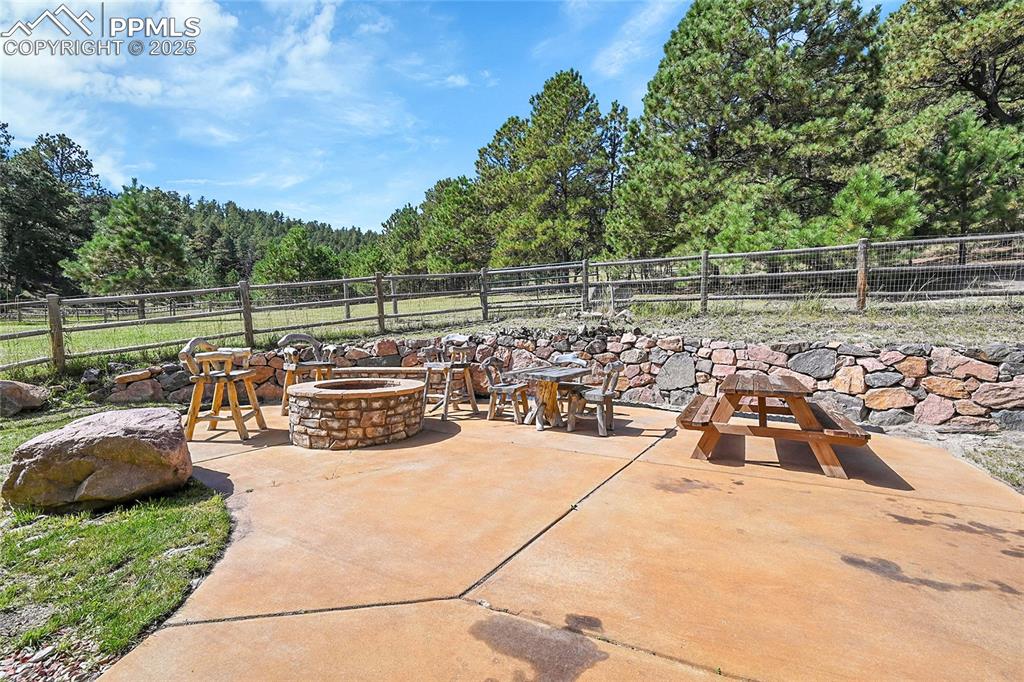 16540 Mesquite Road Peyton, CO 80831 - Photo 10 of 50 a view of a yard with patio