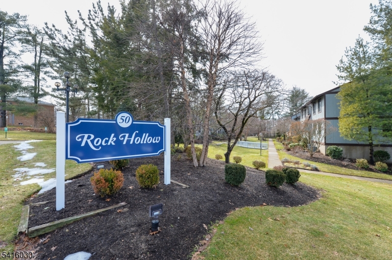 50 Rock Road, Unit 7A Hawthorne, NJ 07506 - Photo 1 of 17 a view of outdoor space with sign board