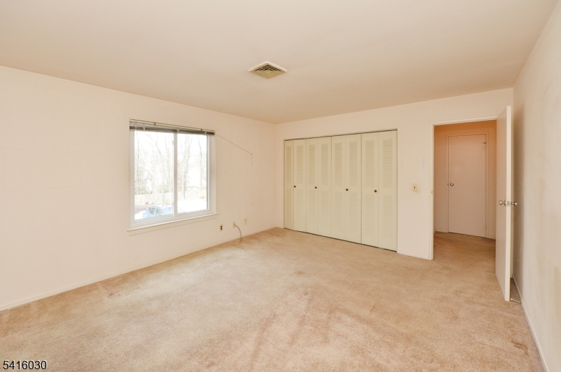 50 Rock Road, Unit 7A Hawthorne, NJ 07506 - Photo 11 of 17 an empty room with windows and closet