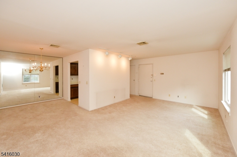 50 Rock Road, Unit 7A Hawthorne, NJ 07506 - Photo 4 of 17 a view of an empty room with a window