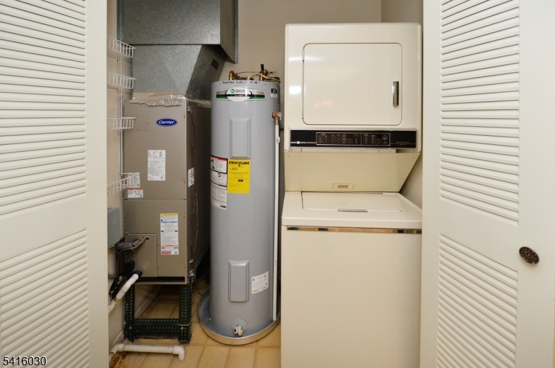 50 Rock Road, Unit 7A Hawthorne, NJ 07506 - Photo 7 of 17 a utility room with dryer and washer