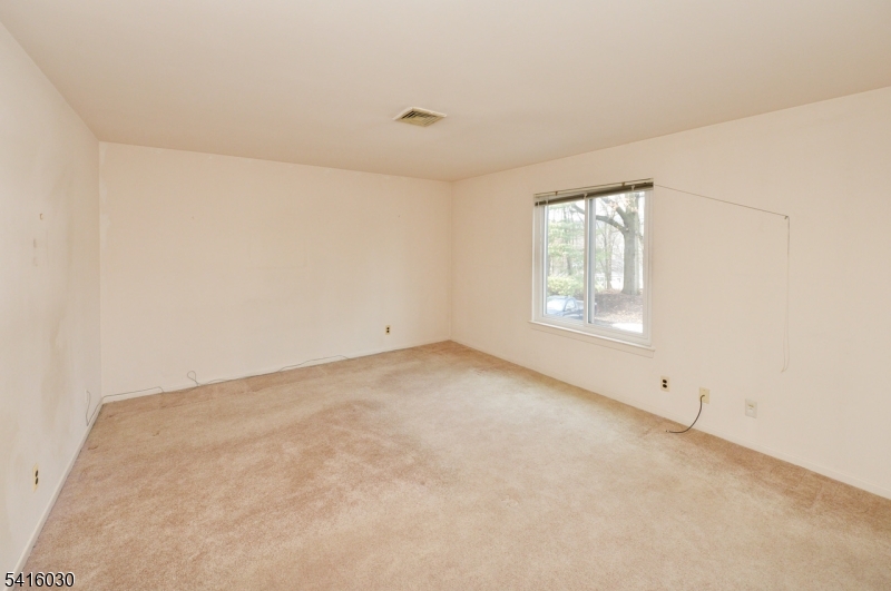 50 Rock Road, Unit 7A Hawthorne, NJ 07506 - Photo 10 of 17 an empty room with windows and closet