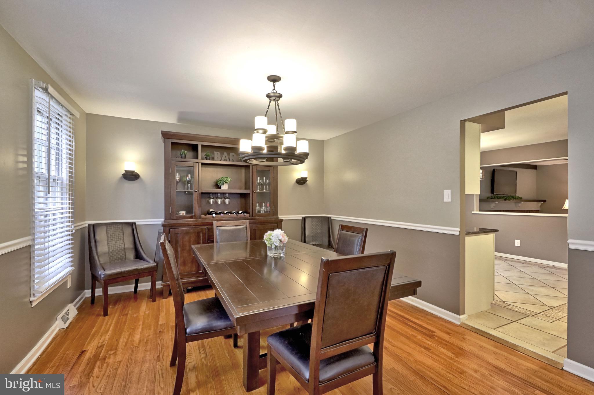 143 Whitemarsh Way Delran, NJ 08075 - Photo 12 of 33 a view of a dining room with furniture and wooden floor